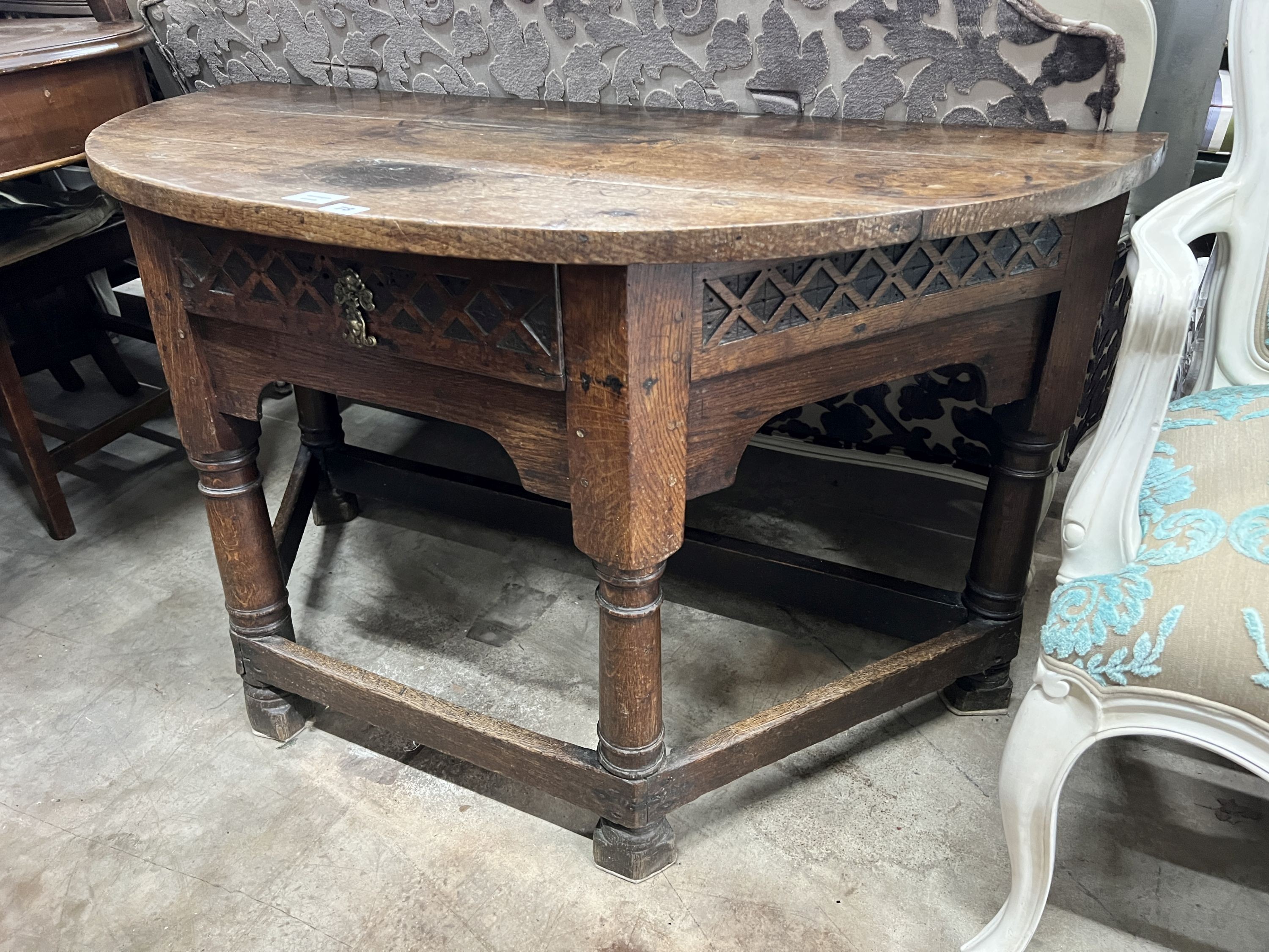 An 18th century oak D shaped side table, width 120cm, depth 58cm, height 71cm